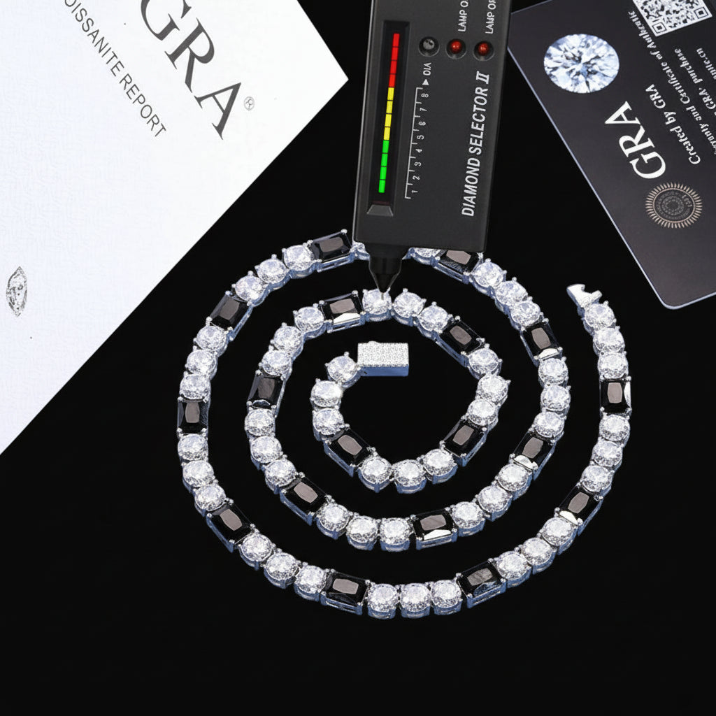 Diamond necklace with black and white stones on a blue background, featuring a diamond selector tool and GRA certification card.