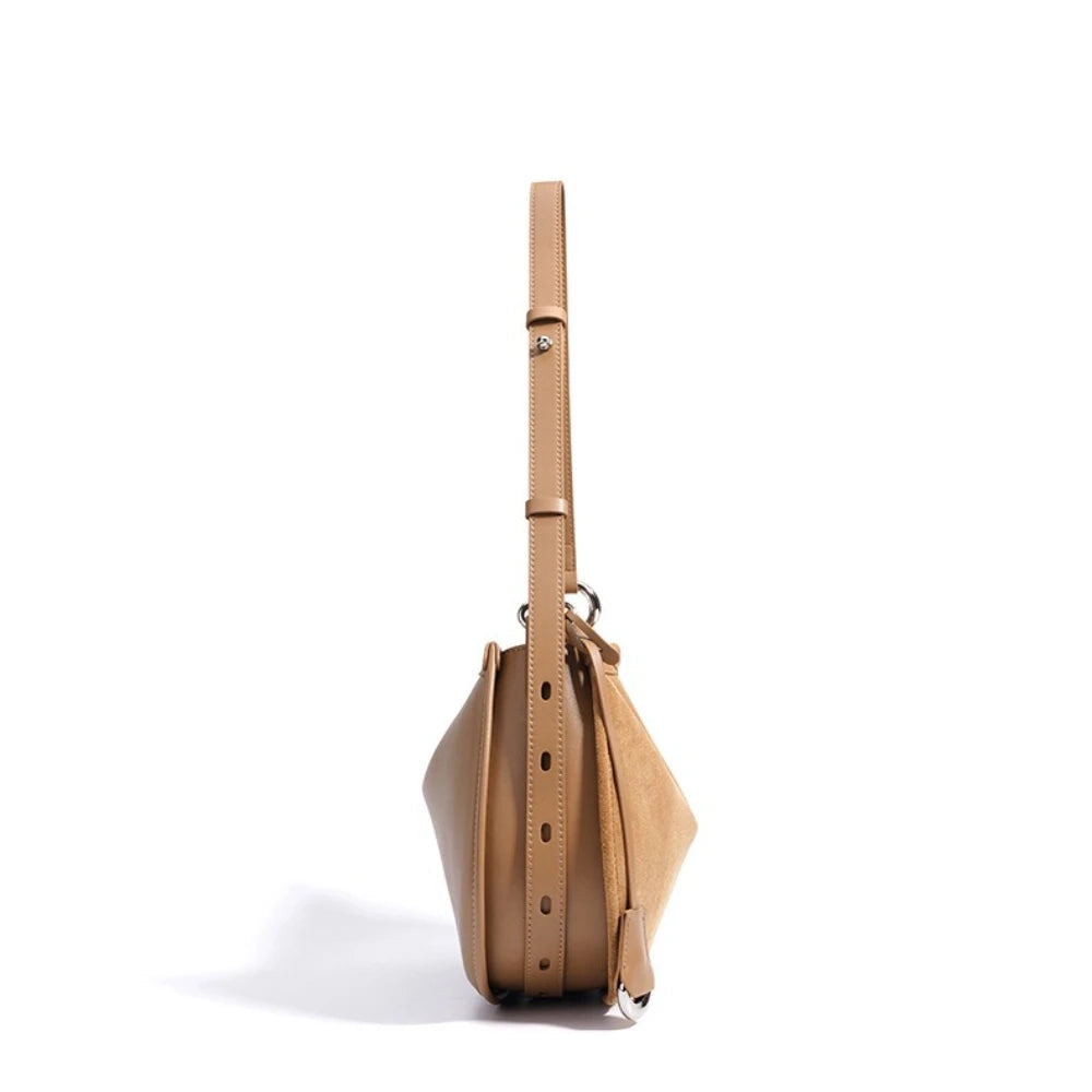 Beige handbag on a white background with 'PASTE' branding.