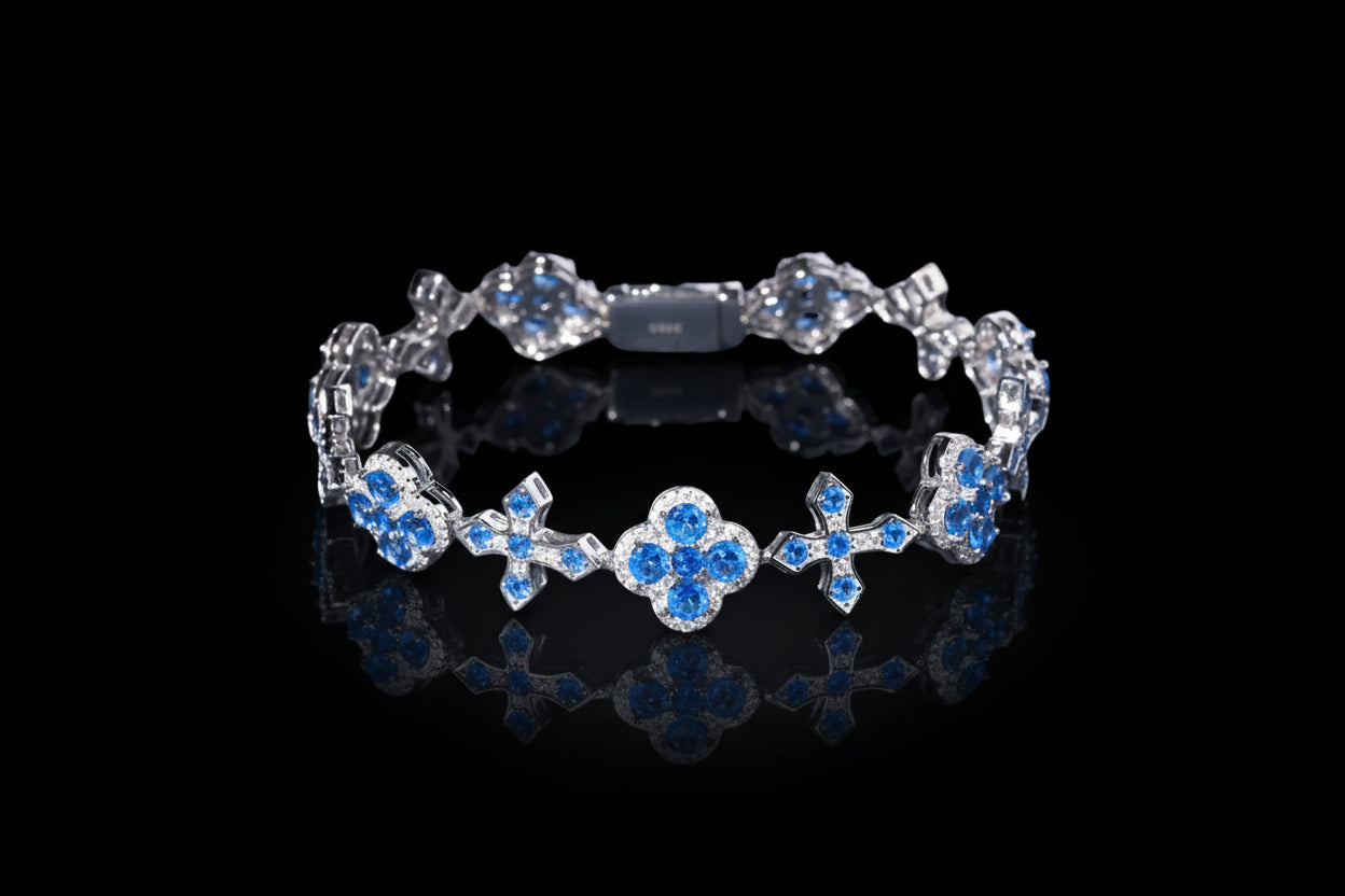 Silver bracelet with blue gemstones on a black background