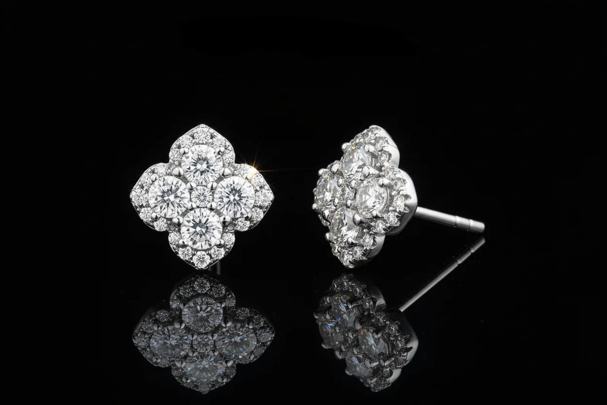 Diamond earrings with branding on a white background