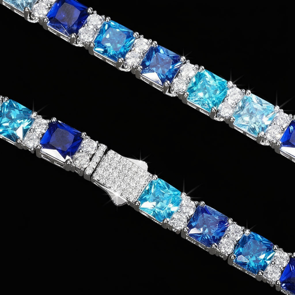 Bracelet with blue and clear gemstones on a blue background