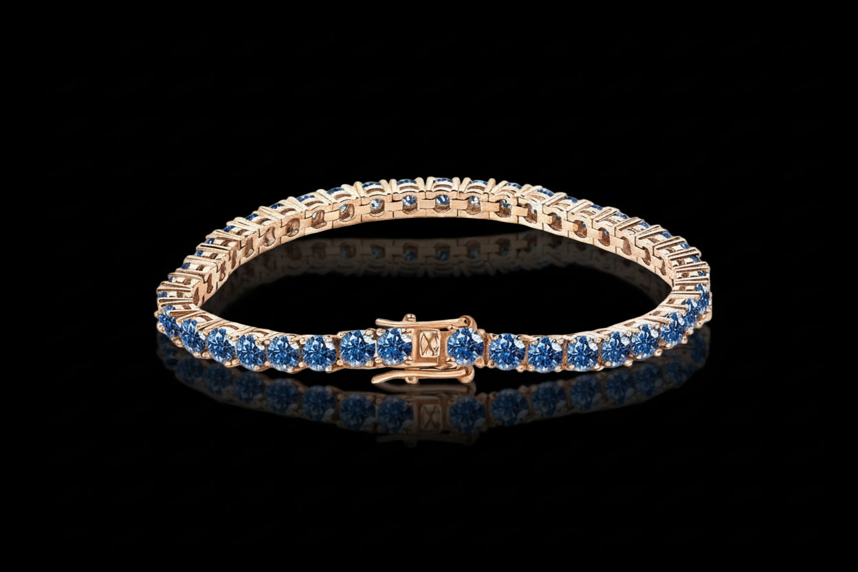 Rose gold bracelet with blue stones on a black background