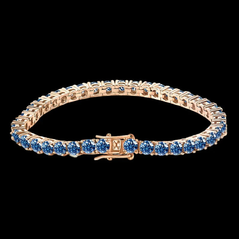 Rose gold bracelet with blue stones on a black background